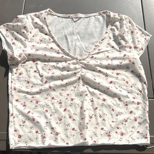 White and pink v neck cropped shirt